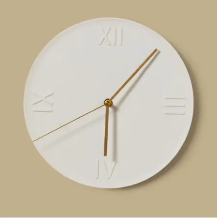 reloj minimalista de pared en cerámica